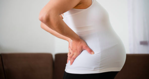 Hire a professional masseuse for some light hand massage during pregnancy. It will help to get you some back pain relief.